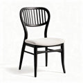 Black wood dining chair with upholstered seat and ergonomic backrest